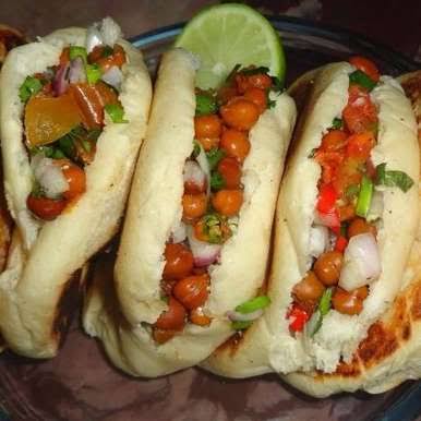 Chana Kulcha, a very popular snack food item sold by street food vendors outside schools. Now there are a few other versions of it, like one with soyabean.
