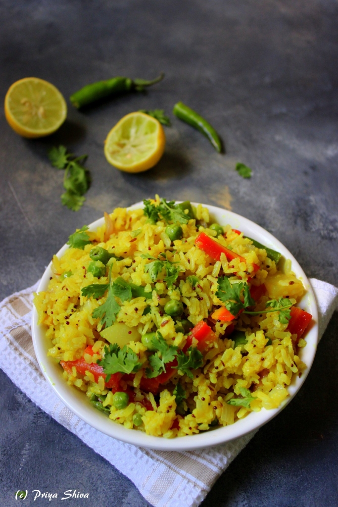 Poha is a popular breakfast eaten all across the country and originated in the state of Madhya Pradesh.Super light and super healthy dish,Poha is made with the flattened rice along with the well-cooked onions, tomatoes and is best savoured with green chillies, curry leaves and a bit of lemon.