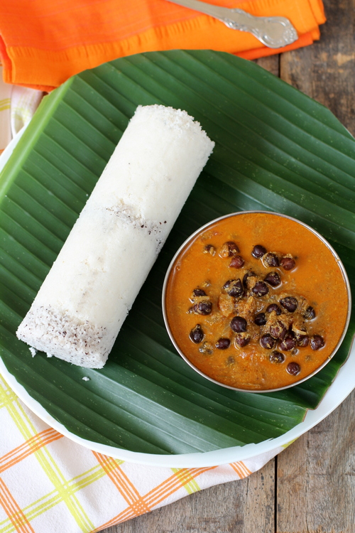 Puttu and Kadala curry is a famous breakfast recipe out of the many Kerala. Puttu is a cylindrical steamed rice cake that is cooked in a mould with grated coconut. It is served with kadala curry(black chickpeas).It tastes best when served with poori or with roti.