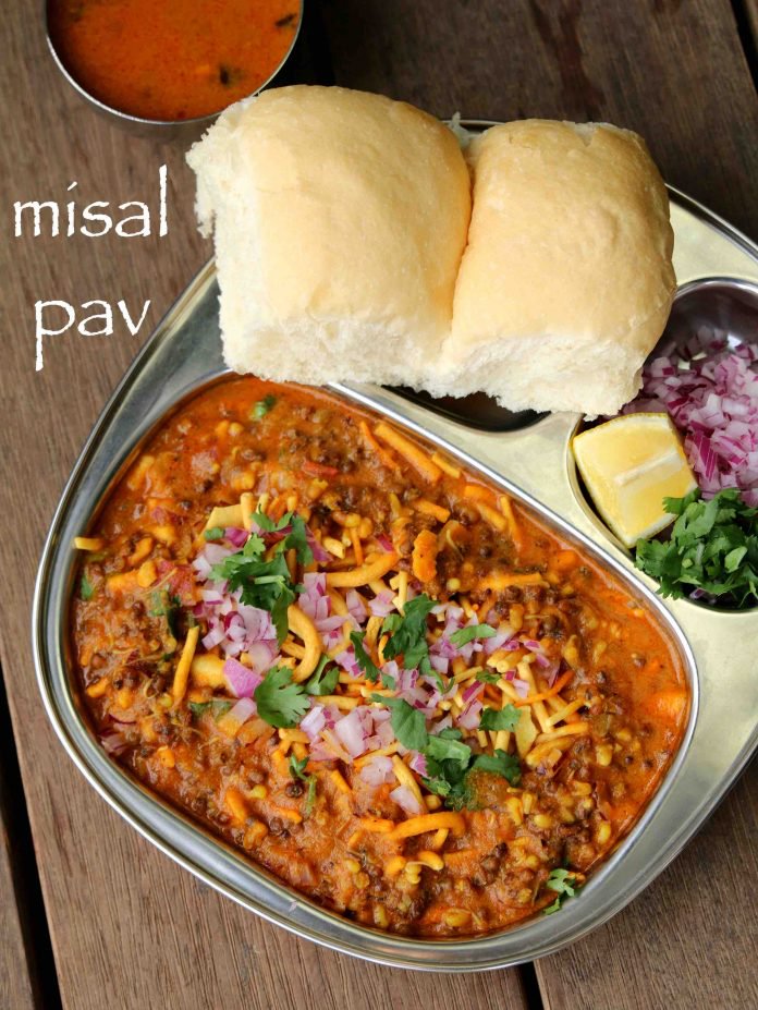 Misal pav  has a spicy and tangy lentil curry which is made with moth beans and is served with Pav bread. At times, it is eaten with yoghurt to lessen the spice.It is decorated with a slice of Lemon and Onion Coriander sprinkled on it. This street food is readily available at any street food joint and served hot.
